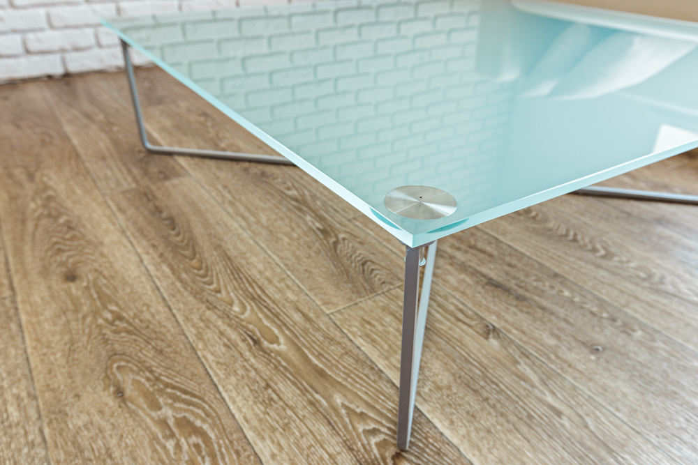 modern glass table in the loft interior