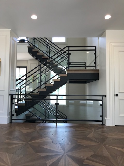 glass railing on flight of stairs